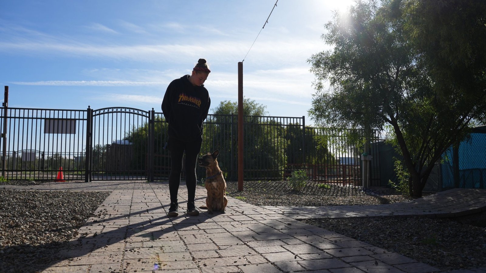 The Cave Creek gated entrance with a staff member and the desert backdrop, the nearest campus for Anthem families down the Carefree Highway.